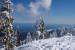 2. This snow scene looks towards the south east over the Strait of Georgia towards Powell River. The brilliant sun, snow clad trees and puffy clouds create pictures to remember.